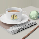 Tea Cup Mockup Featuring Ringed Notebook, Gemstones and a Pencil