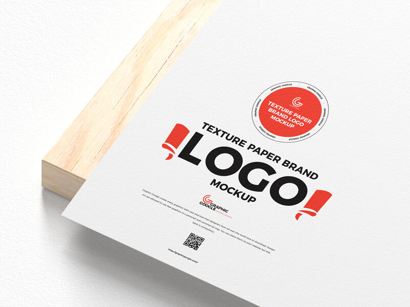 Textured Paper Logo Mockup on a Wooden Board