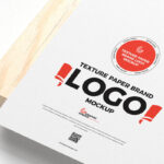 Textured Paper Logo Mockup on a Wooden Board