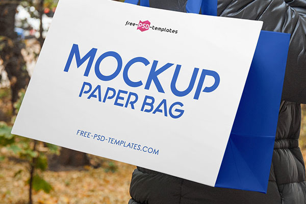 Three Paper Bag with Handle Mockups with an Outdoors Background