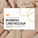 Top Shot of Business Card Mockup on Blanket