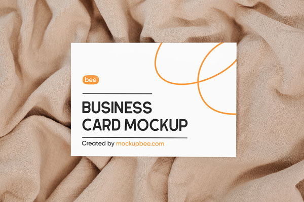 Top Shot of Business Card Mockup on Blanket