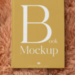 Top Showcase of Book Mockup on Shaggy Blanket