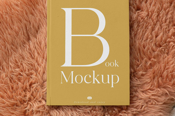 Top Showcase of Book Mockup on Shaggy Blanket