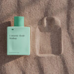 Top Showcase of Lying Bottle Mockup on Sand