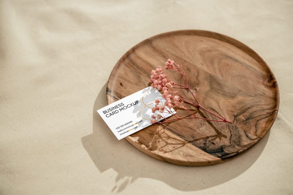 Top Side View of Business Card Mockup on Round Plate