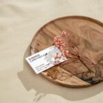 Top Side View of Business Card Mockup on Round Plate