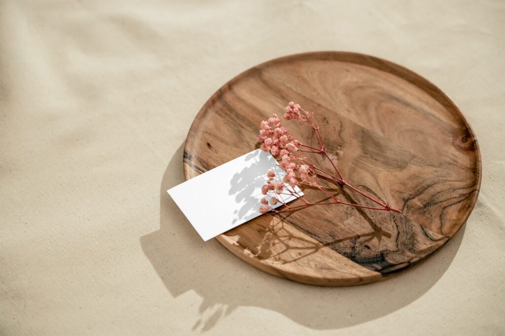 Top Side View of Business Card Mockup on Round Plate