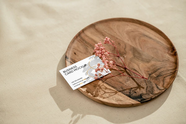 Top Side View of Business Card Mockup on Round Plate