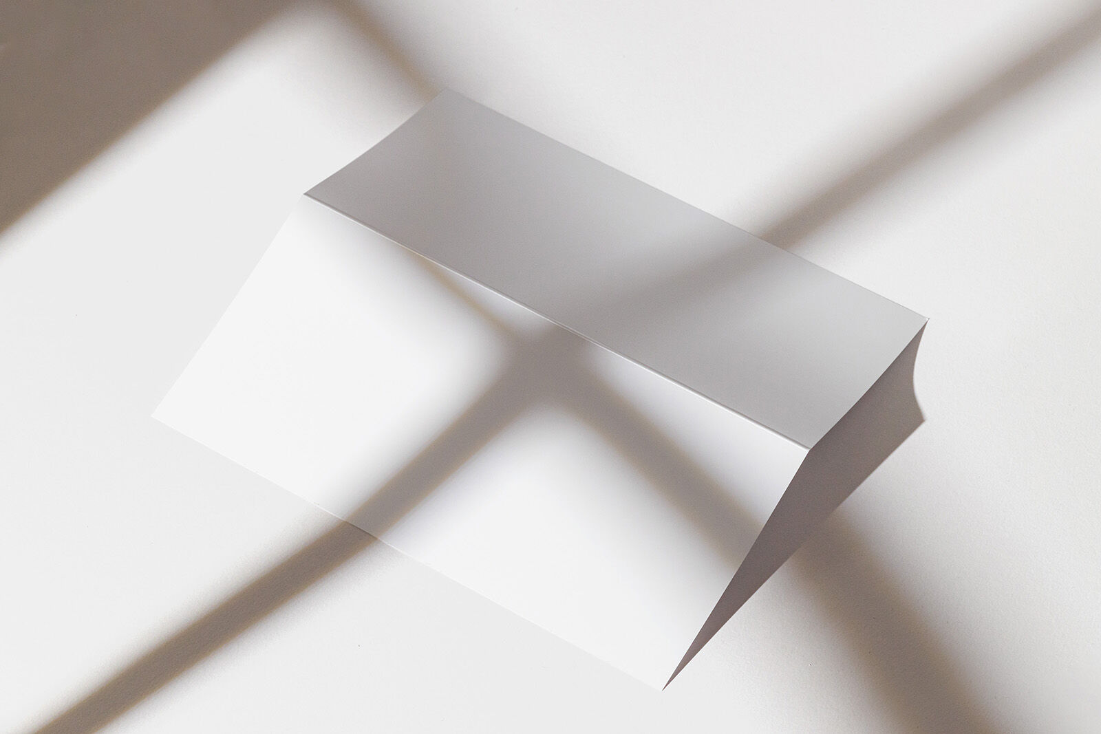 Top Side View of Face-down Bi-Fold Brochure Mockup FREE PSD