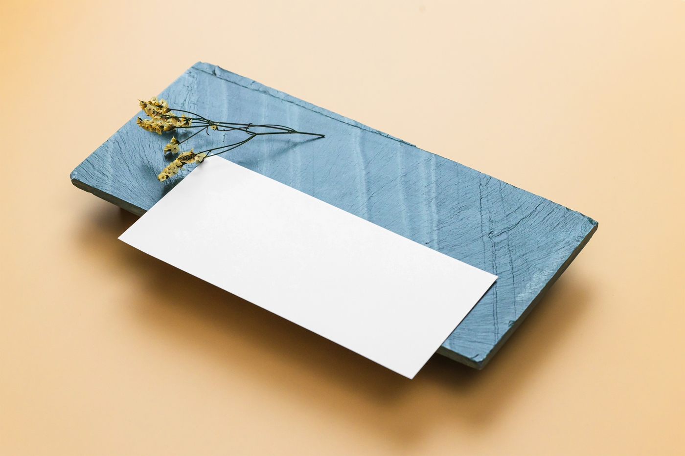 Top Side View of Vertical Paper Card Mockup on Brick FREE PSD