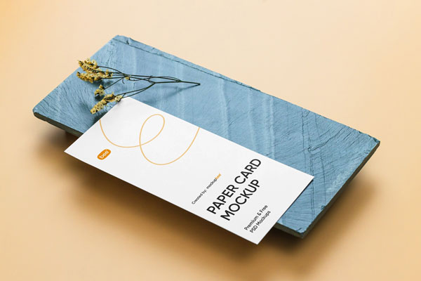 Top Side View of Vertical Paper Card Mockup on Brick