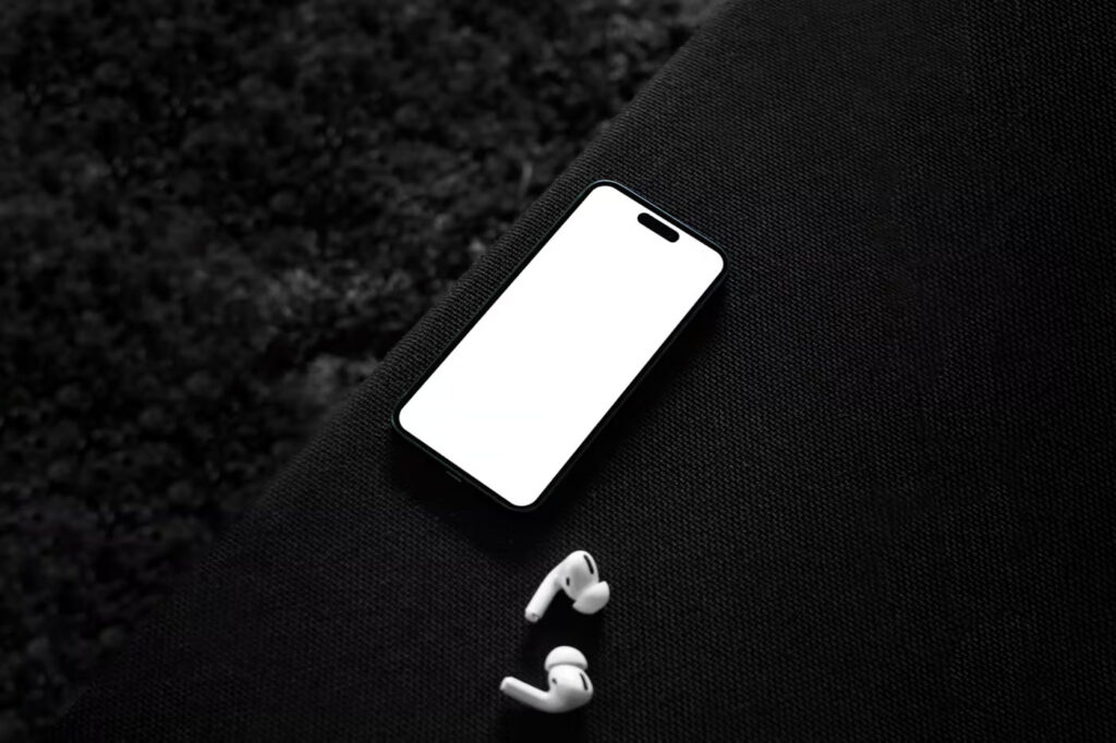 Top Sight of iPhone 14 Pro Mockup on Sofa