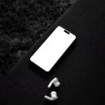 Top Sight of iPhone 14 Pro Mockup on Sofa