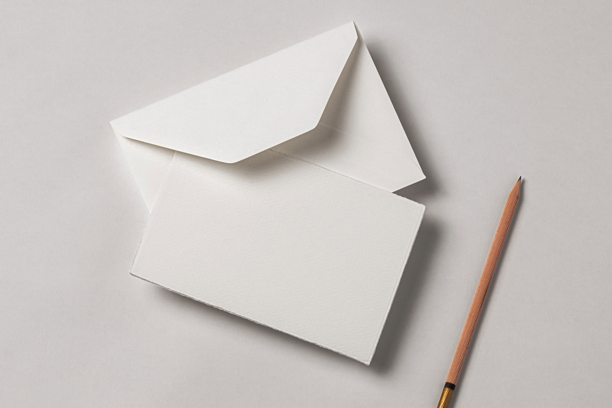 Free Top Sight of Recycled Invitation Card Mockup with Pencil PSD Template