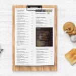 Top View Clipboard with Restaurant Menu on Table Mockup Scene