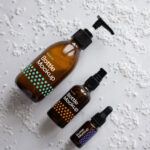 Top View Different Sizes Cosmetics Amber Bottles Mockup