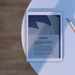 Top View iPad Mockup on Table Next to Pencil