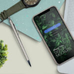 Top View iPhone 11 Pro on a Workstation Mockup