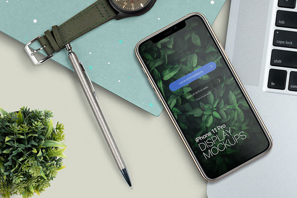 Top View iPhone 11 Pro on a Workstation Mockup