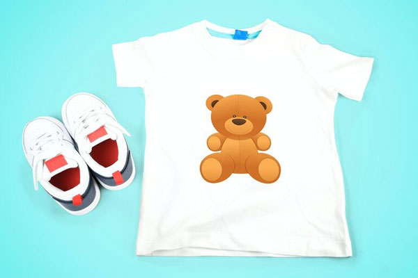 Top View Kids T-shirt Mockup Next to Kids Sneakers