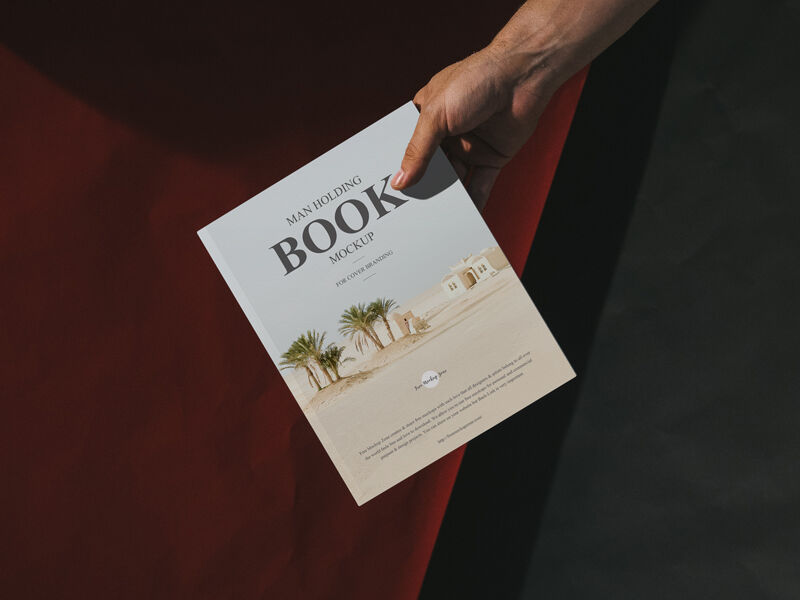 Top View Male Hand Holding Book Mockup