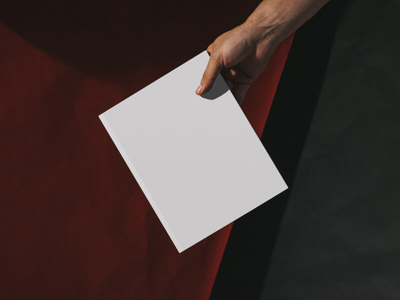 Top View Male Hand Holding Book Mockup