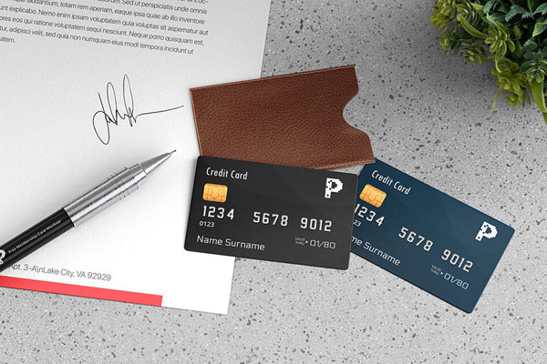 Top View Mockup of Two Credit Cards with Leather Holder