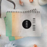Top View Mockup Scene of Stack of Notebooks