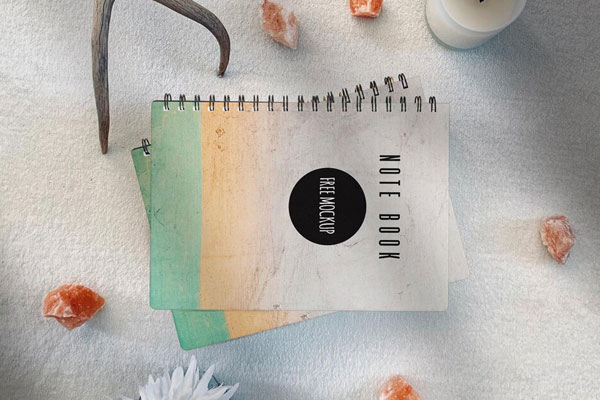 Top View Mockup Scene of Stack of Notebooks