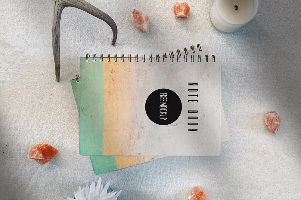 Top View Mockup Scene of Stack of Notebooks