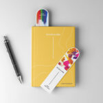 Top View of 2 Bookmark Mockups on a Book Cover