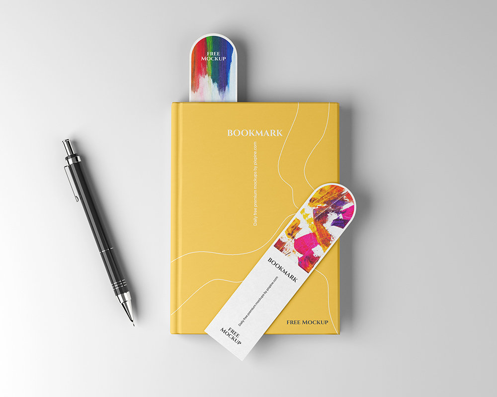 Top View of 2 Bookmark Mockups on a Book Cover