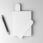 Top View of 2 Bookmark Mockups on a Book Cover