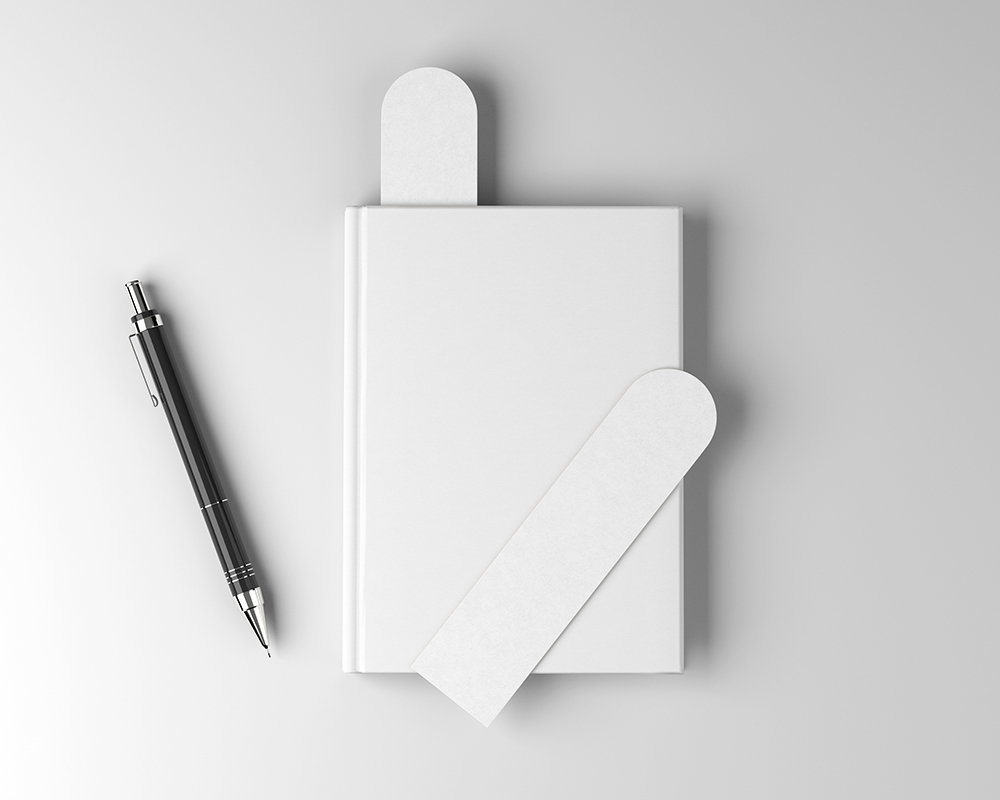 Top View of 2 Bookmark Mockups on a Book Cover