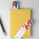Top View of 2 Bookmark Mockups on a Book Cover