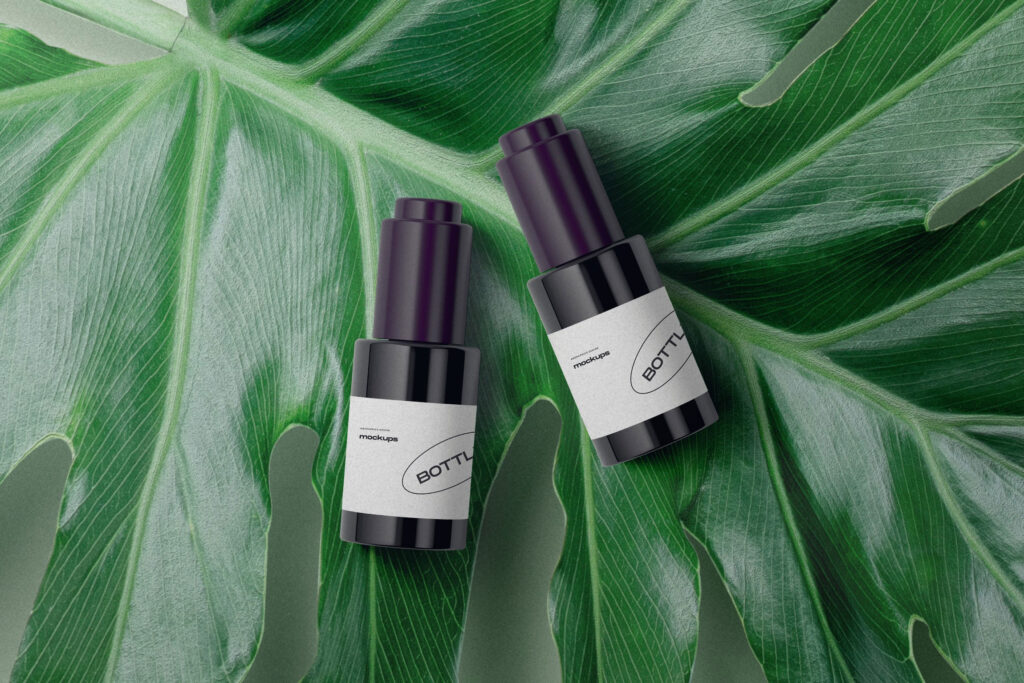 Top View of 2 Bottle Mockup on Large Leaf