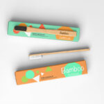 Top View of 2 Box Mockups with 2 Bamboo Toothbrushes