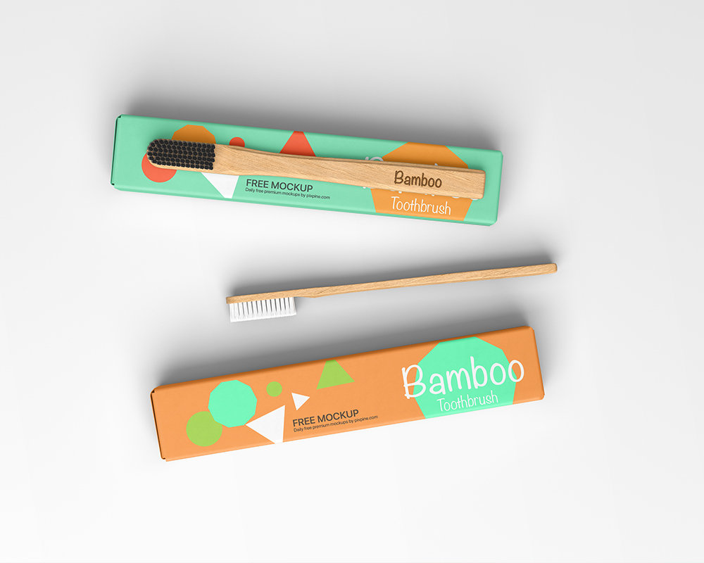 Top View of 2 Box Mockups with 2 Bamboo Toothbrushes