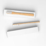 Top View of 2 Box Mockups with 2 Bamboo Toothbrushes