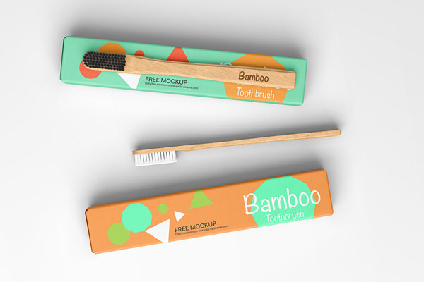 Top View of 2 Box Mockups with 2 Bamboo Toothbrushes
