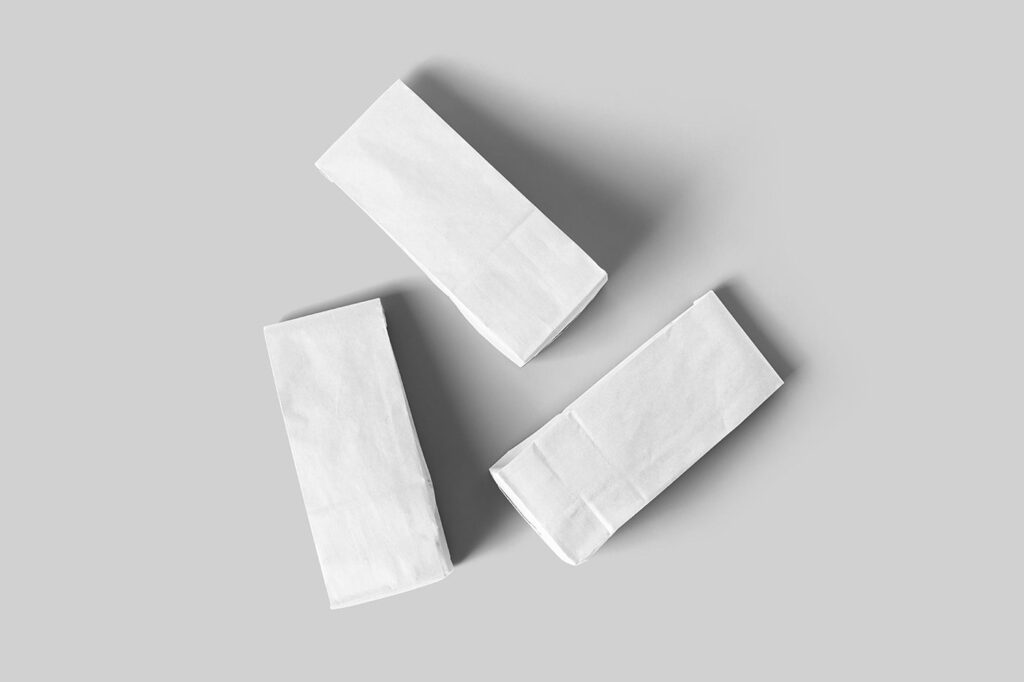 Top View of 3 Lying Eco Paper Bags Mockup