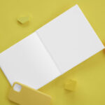 Top View of 3 Mockups of Hard Cover Book on Desk