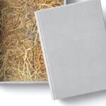 Top View of a Box with Hay and Book Mockup