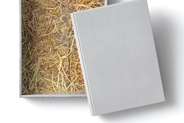 Top View of a Box with Hay and Book Mockup