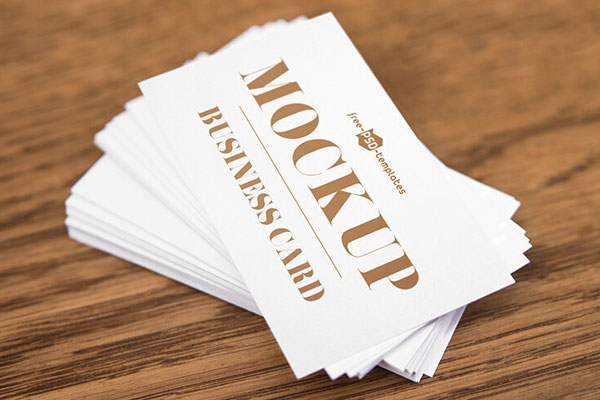Top View of a Business Card on a Pile Mockup