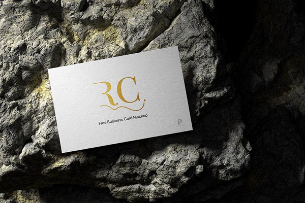Top View of a Business Card on a Rock Mockup