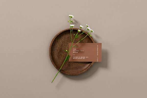 Top View of a Business Card with a Flower Mockup