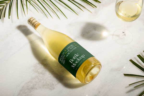 Top View of a Champagne Bottle Mockup with a Glass