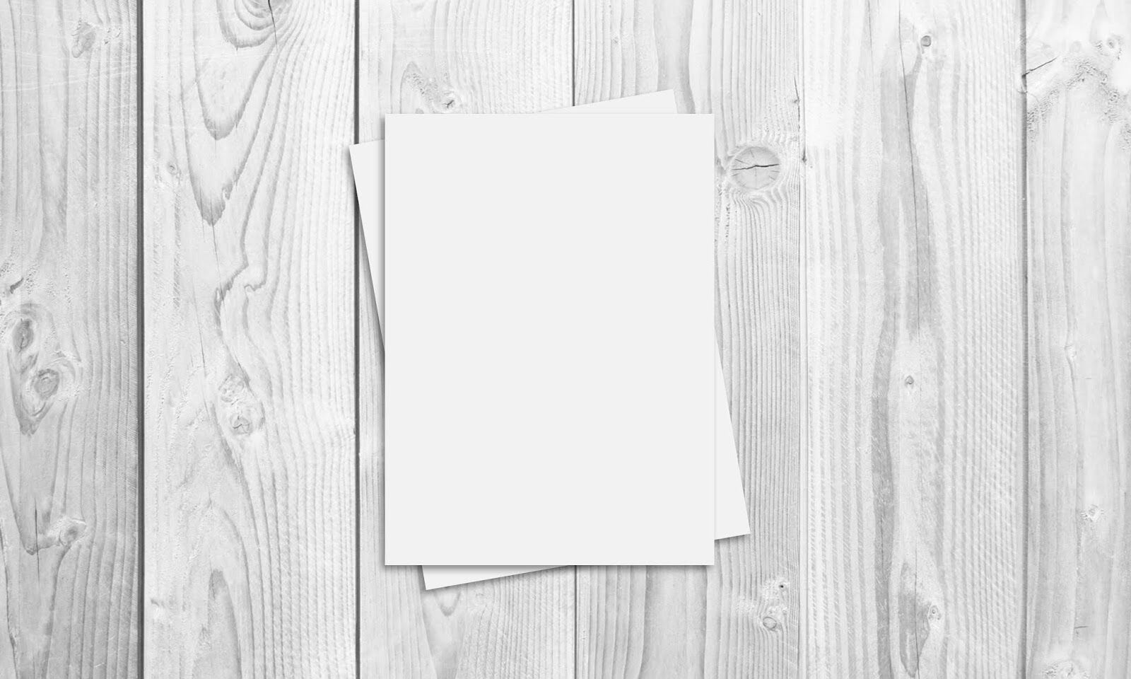 Top View of a Flyer/Poster on a Wooden Table Mockup FREE PSD